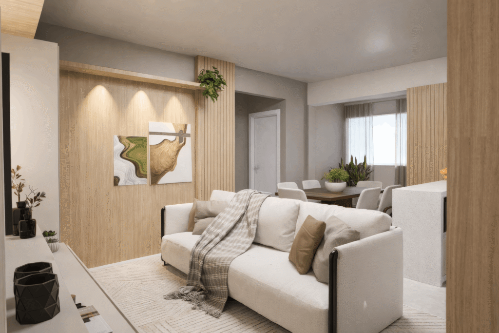 Projeto de sala de estar integrada assinado por Arquiteto Palhoça com painel de madeira e sofá branco.