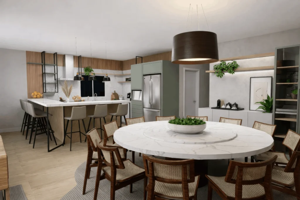 Área social integrada com mesa de jantar redonda de mármore e cozinha gourmet verde sálvia, projeto assinado por Arquiteto Palhoça.