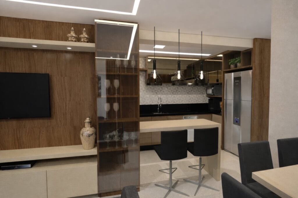 Cozinha integrada com cristaleira de vidro e bancada elegante projetada por Arquiteto São José.