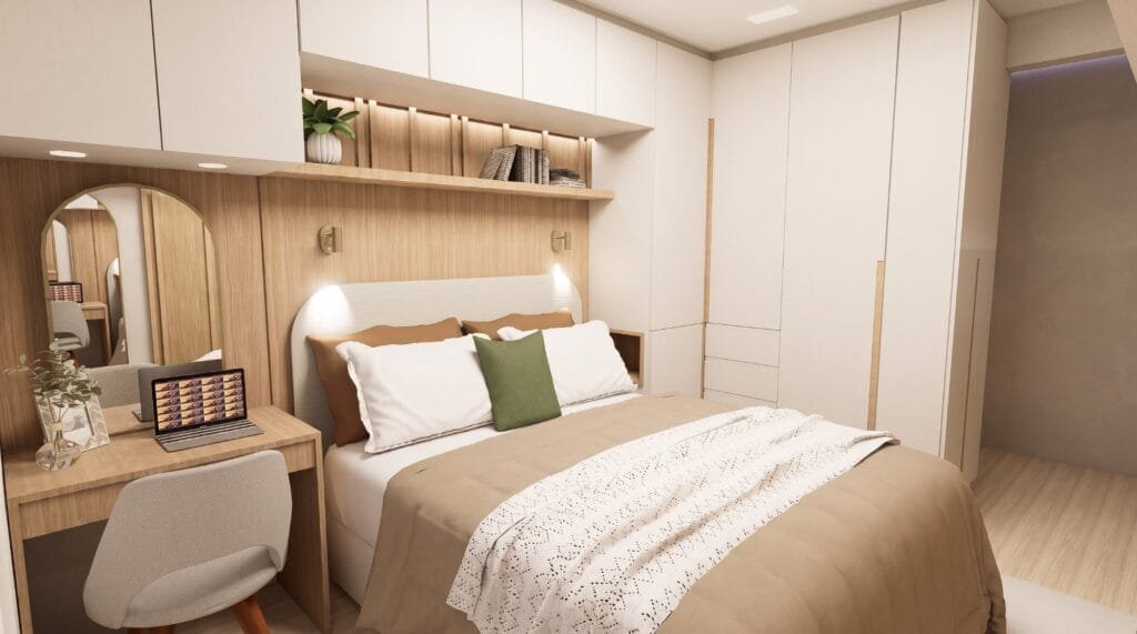 Quarto de casal com marcenaria planejada em tons claros e bancada penteadeira assinada por arquiteto Garopaba.